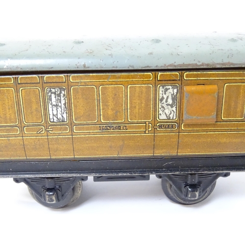 1179 - Toys - Model Train / Railway Interest : A quantity of Hornby tin plate O gauge railway items to incl... 