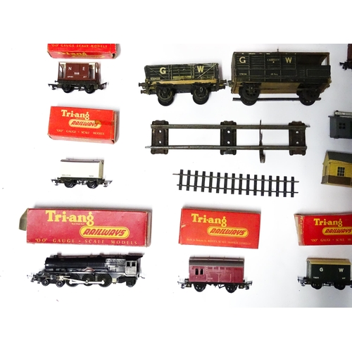 1180 - Toys - Model Train / Railway Interest : A quantity of Tri-ang OO gauge locomotives, wagons, carriage... 