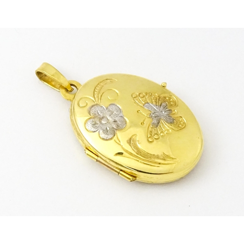 835 - A 9ct gold locket with butterfly and flower detail, on a 9ct gold chain sections. Locket approx. 1