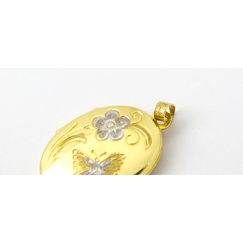 835 - A 9ct gold locket with butterfly and flower detail, on a 9ct gold chain sections. Locket approx. 1