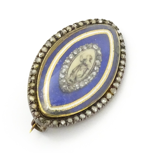 836 - A late 18th / early 19thC mourning brooch / memorial locket of navette form with hand painted sepia ... 