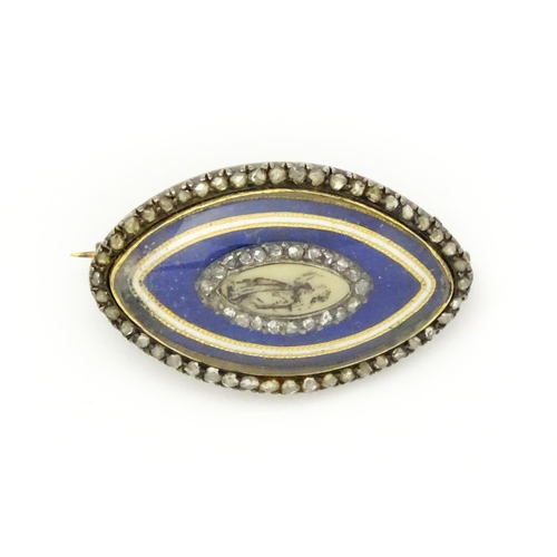 836 - A late 18th / early 19thC mourning brooch / memorial locket of navette form with hand painted sepia ... 