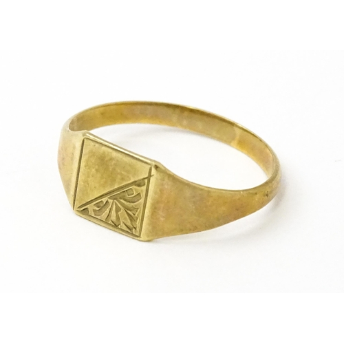 840 - A 9ct gold signet ring. Ring size approx. K. (Approx. 1g)