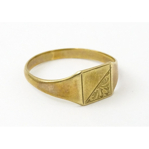 840 - A 9ct gold signet ring. Ring size approx. K. (Approx. 1g)