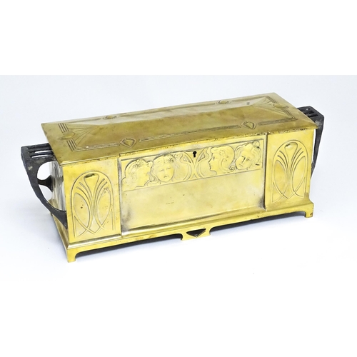 1200 - A WMF Art Nouveau brass casket / box with twin handles and hinged lid, decorated with four embossed ... 