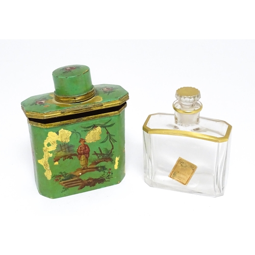 1224 - An early 20thC French glass perfume flask / scent bottle with gilt highlights, with gilt metal trave... 