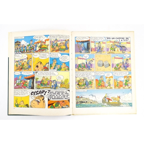 2304 - Books: A quantity of Asterix books comprising Les Lauriers De Cesar, 1972; Le Devin, 1972; Obelix et... 