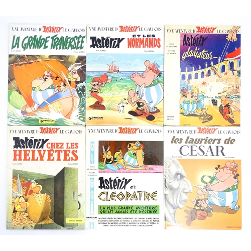 2304 - Books: A quantity of Asterix books comprising Les Lauriers De Cesar, 1972; Le Devin, 1972; Obelix et... 