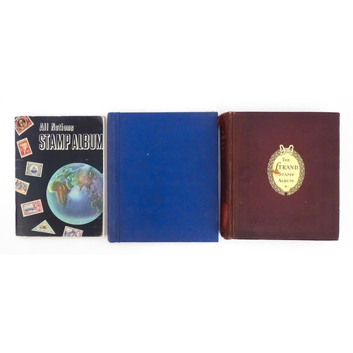 2477 - Stamps & Postal History : Three albums containing assorted 20thC Worldwide and Commonwealth stamps t... 