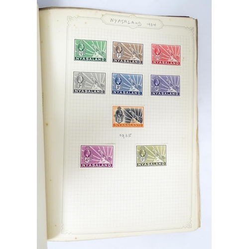 2478 - Stamps & Postal History : A stamp album containing 20thC Worldwide and Commonwealth stamps, to inclu... 