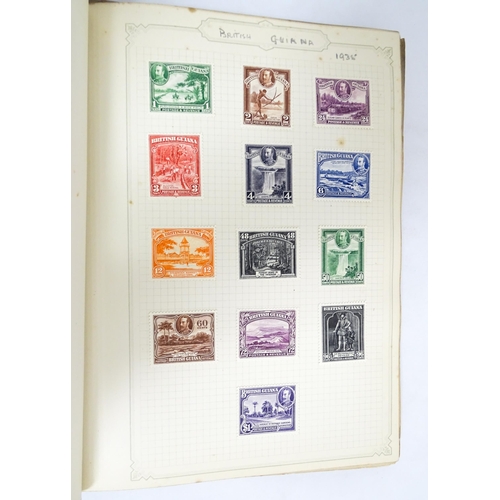 2478 - Stamps & Postal History : A stamp album containing 20thC Worldwide and Commonwealth stamps, to inclu... 