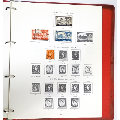 2482 - Stamps & Postal History : A stamp album containing various Great Britain stamps, to include various ... 