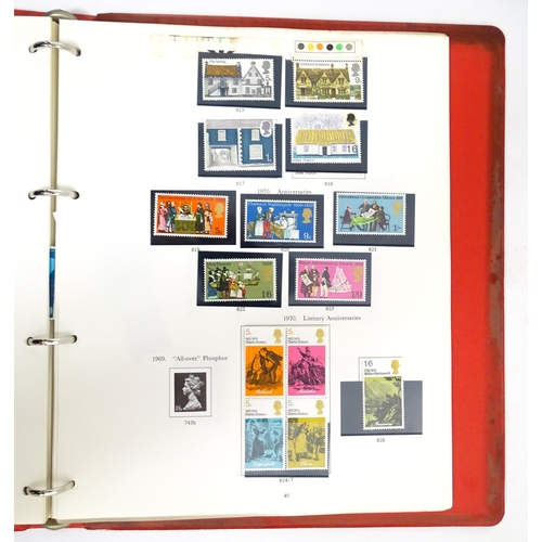 2482 - Stamps & Postal History : A stamp album containing various Great Britain stamps, to include various ... 