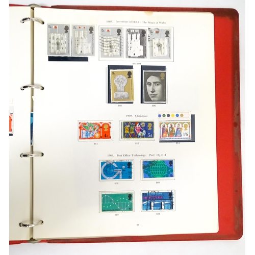 2482 - Stamps & Postal History : A stamp album containing various Great Britain stamps, to include various ... 