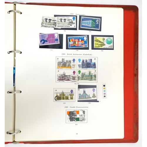 2482 - Stamps & Postal History : A stamp album containing various Great Britain stamps, to include various ... 