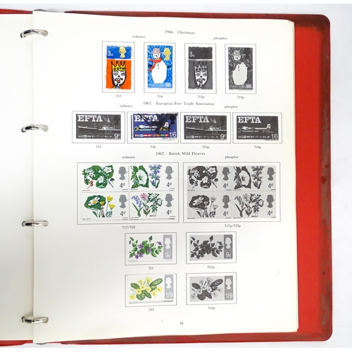 2482 - Stamps & Postal History : A stamp album containing various Great Britain stamps, to include various ... 