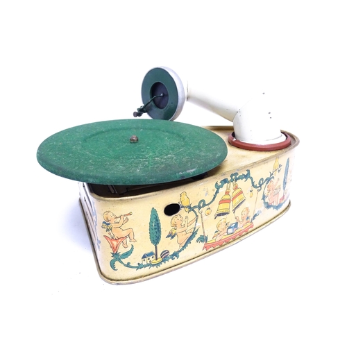 1174 - Toy: A 20thC German Bing tinplate clockwork Bingola 1 phonograph, together with assorted records. Ap... 