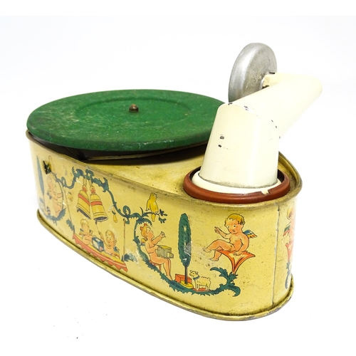 1174 - Toy: A 20thC German Bing tinplate clockwork Bingola 1 phonograph, together with assorted records. Ap... 