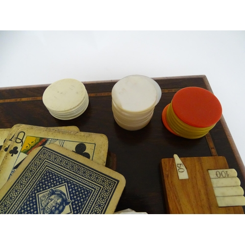 1176A - Toys: Two 20thC boxes with inlaid decoration containing assorted gaming components to include mother... 