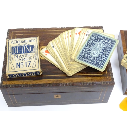 1176A - Toys: Two 20thC boxes with inlaid decoration containing assorted gaming components to include mother... 