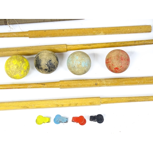 1189 - Toys: A boxed Jacques croquet set to include mallets, balls, hoops, centre peg, etc. Box approx. 42