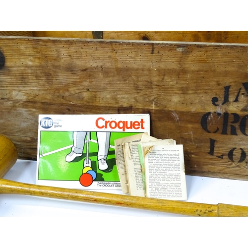 1189 - Toys: A boxed Jacques croquet set to include mallets, balls, hoops, centre peg, etc. Box approx. 42