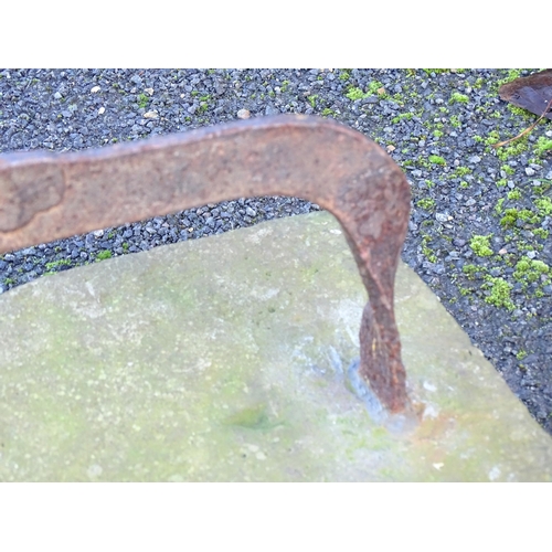 1596 - A 19thC cast iron boot scraper with stone base, approx 20