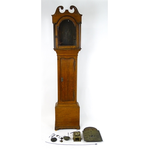 1645 - A late 18thC / early 20thC oak cased long case clock with brass break arch dial signed John Skinner ... 