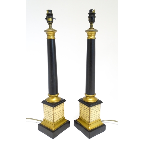 1682 - A pair of late 20th / early 21stC John Lewis table lamps with script detail. Approx. 22