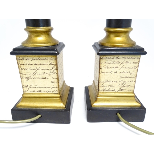 1682 - A pair of late 20th / early 21stC John Lewis table lamps with script detail. Approx. 22