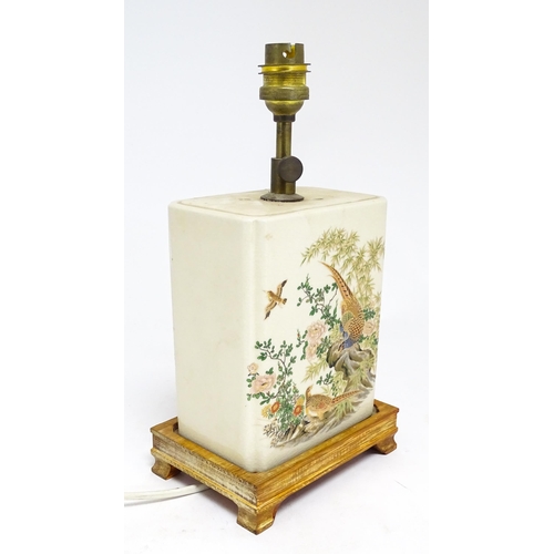 1692 - A 20thC table lamp the rectangular ceramic body decorated with pheasants and birds in a landscape. O... 