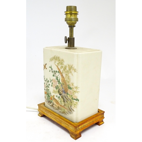 1692 - A 20thC table lamp the rectangular ceramic body decorated with pheasants and birds in a landscape. O... 