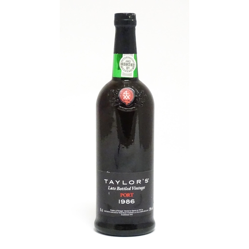 1144A - A 75cl bottle of 1986 Taylor's late bottled vintage port.