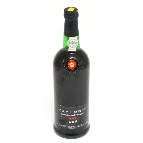 1144A - A 75cl bottle of 1986 Taylor's late bottled vintage port.