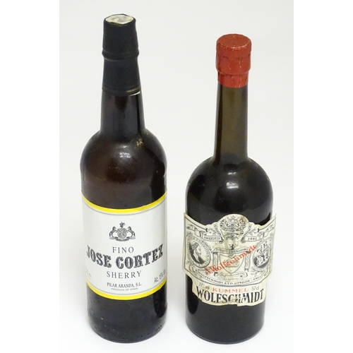 1148A - A 75cl bottle of Jose Cortez sherry, together with a 57cl bottle of Wolfschmidt kummel (2)