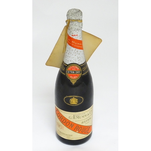 1150A - A bottle of G. H. Mumm Cordon Rouge champagne, approx 75cl, stamped with batch number 81230866