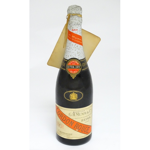 1150A - A bottle of G. H. Mumm Cordon Rouge champagne, approx 75cl, stamped with batch number 81230866