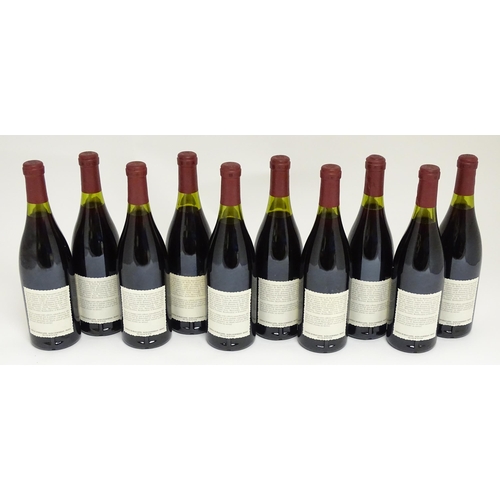 1154 - Ten 75cl bottles of Chateau de Beaucastel 
Chateauneuf du Pape 1990 red wine (10)