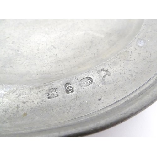 781 - Three 19thC pewter plates, variously marked with makers marks/ touchmarks and date of 1858, each app... 