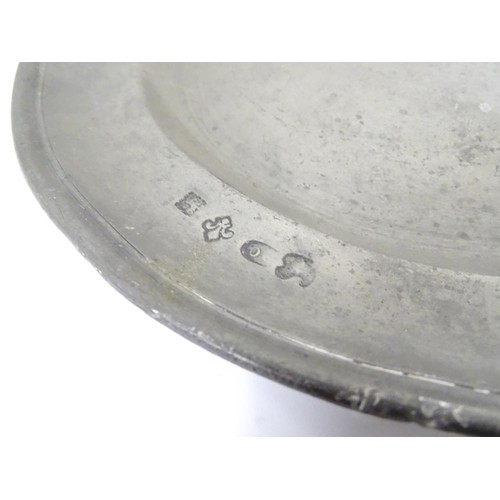 781 - Three 19thC pewter plates, variously marked with makers marks/ touchmarks and date of 1858, each app... 