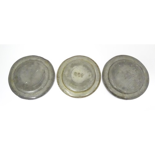 781 - Three 19thC pewter plates, variously marked with makers marks/ touchmarks and date of 1858, each app... 