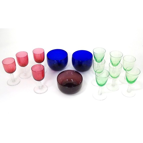 782 - A quantity of assorted glassware to include Bristol blue glass coloured rinser, amethyst rinser, and... 