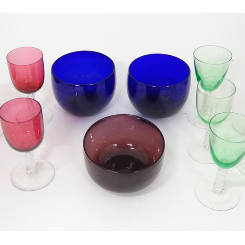 782 - A quantity of assorted glassware to include Bristol blue glass coloured rinser, amethyst rinser, and... 