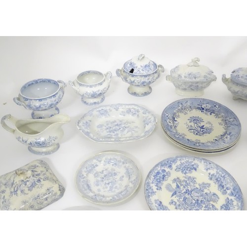 792 - A quantity of assorted blue and white dinner wares to include plates, tureens / serving dishes, sauc... 