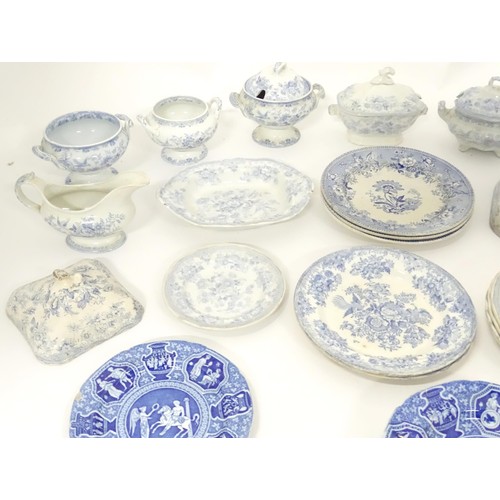 792 - A quantity of assorted blue and white dinner wares to include plates, tureens / serving dishes, sauc... 