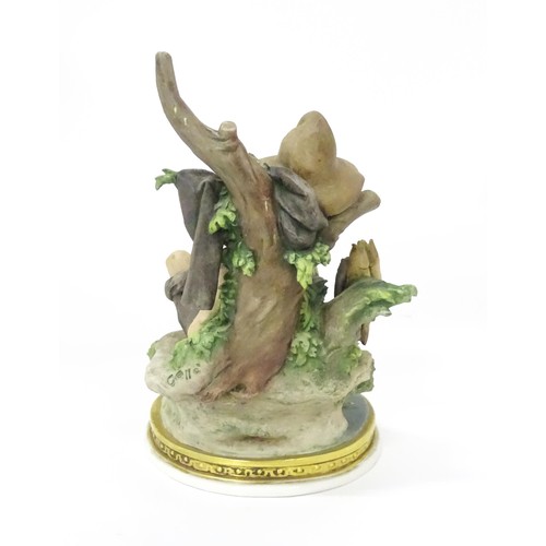 863 - A Capodimonte figure modelled as a sleeping fisherman, designed by Giuseppe Cappe. Approx. 9 3/4