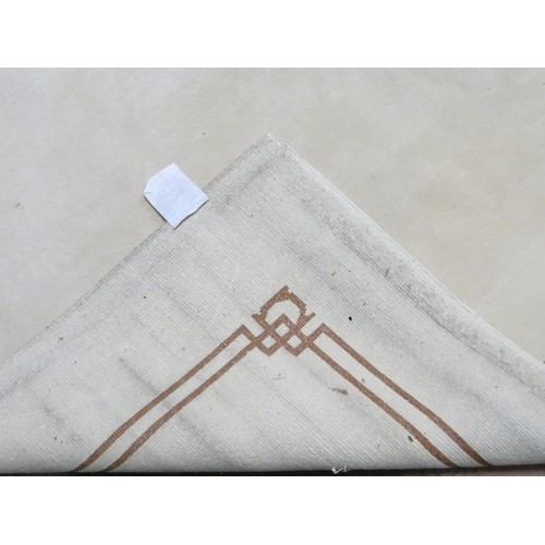 874 - A Tibetan / Nepalese cream carpet with linear border decoration , approx 95