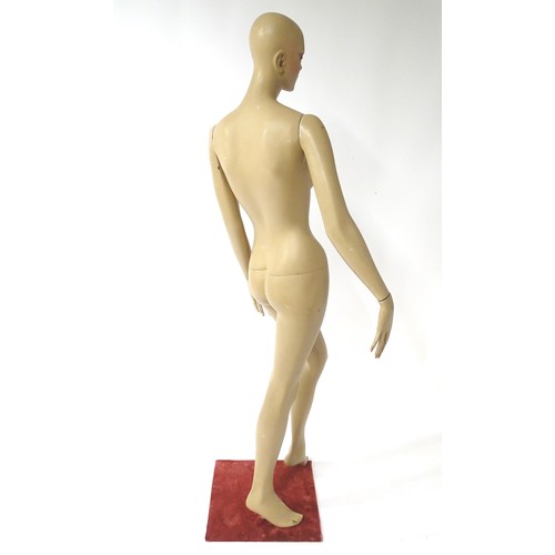 875 - A late 20th-early 21stC female mannequin / shop display dummy , with semi-articulated and separable ... 