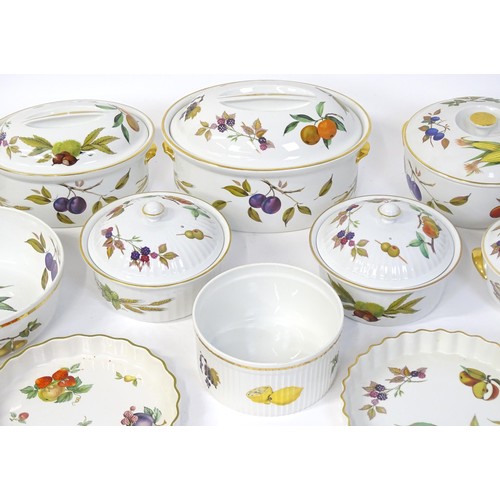 876 - A large quantity of Royal Worcester dinner wares in the Evesham pattern to include plates, tureens, ... 