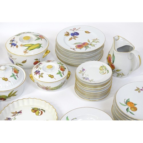 876 - A large quantity of Royal Worcester dinner wares in the Evesham pattern to include plates, tureens, ... 